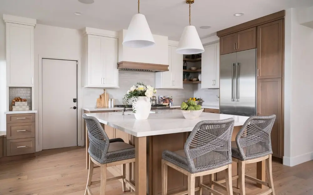 upper-cabinetry-framed-in-Omega-Dynasty-Alderwood-in-Elemental-White-blair-style-shaker-doors