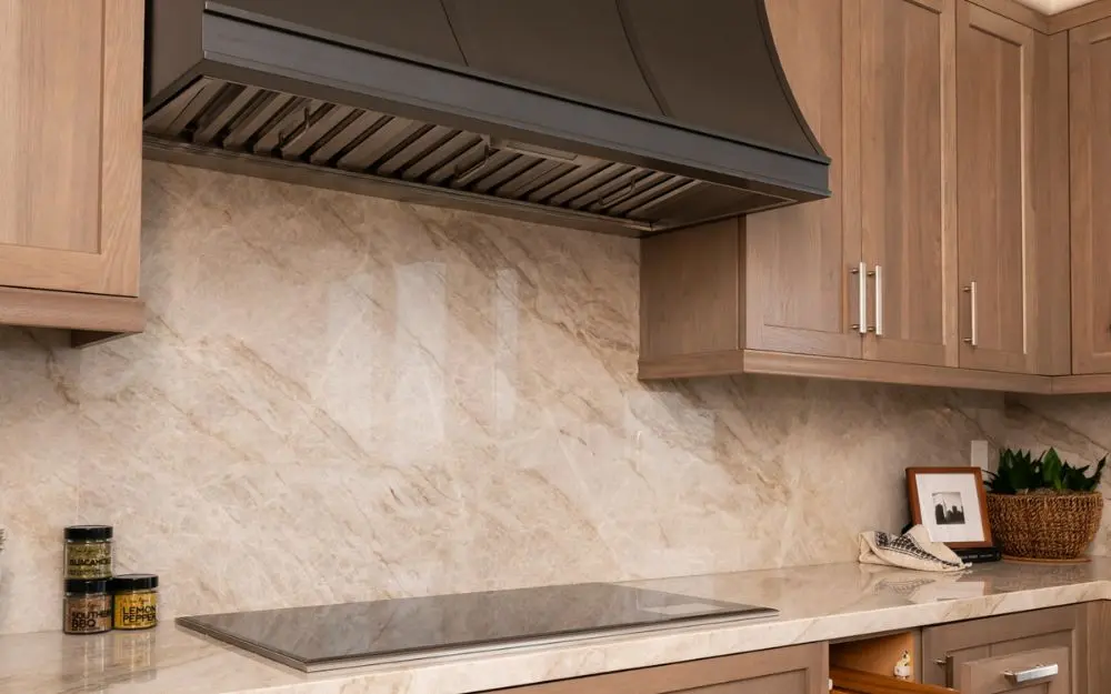 cabinetry-includes-custom-spice-rack-next-to-induction-cooktop-