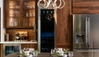 sea-pointe-design-and-remodel-customized-bar-featuring-Omega-walnut-cabinetry-in-a-natural-finish-and-glass-inserts