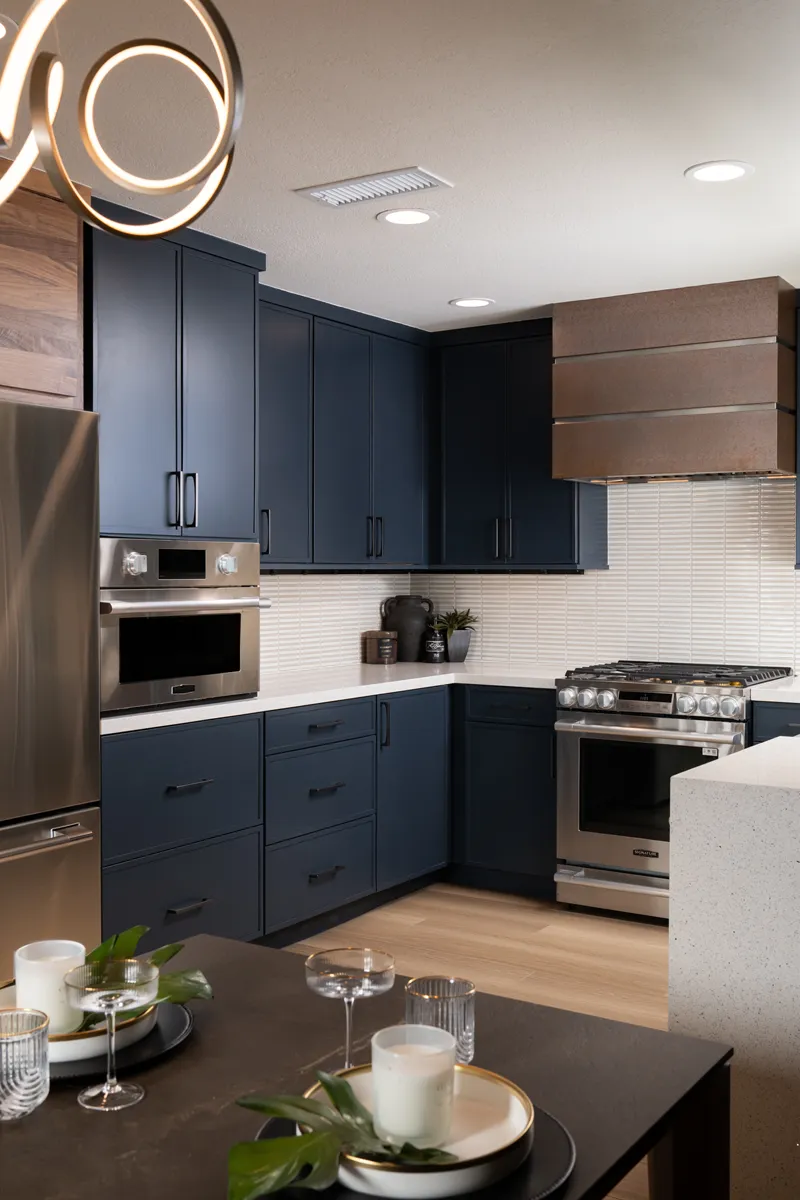 sea-pointe-design-and-remodel-copper-metal-hood-stainless-steel-appliances-instant-hot-water-tank-and-a-hot-water-dispenser-in-graphite