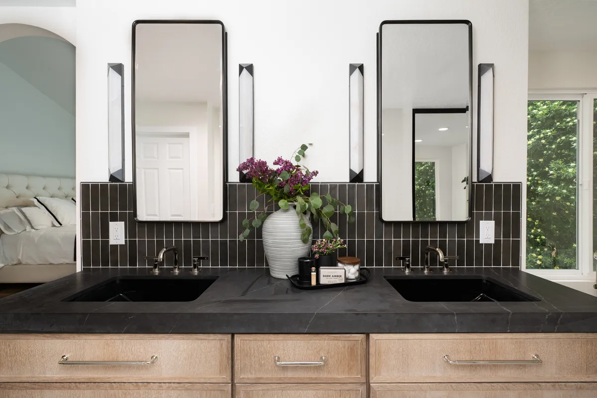 sea-pointe-design-and-remodel-urban-bronze-vanity-lights-and-2-vintage-slim-medicine-cabinets-with-black-trim-sit-above-the-vanity