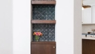13-Sea-Pointe-Design-and-Remodel-corner-niche-with-storage-and-floating-shelves