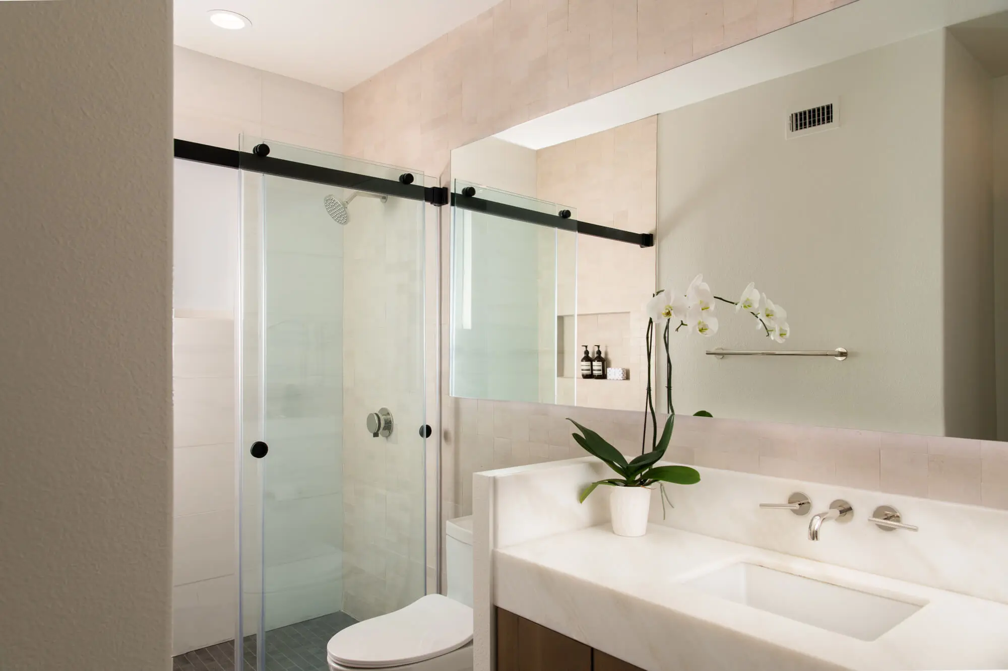 Newport Coast bathroom remodel with sliding barn door style shower