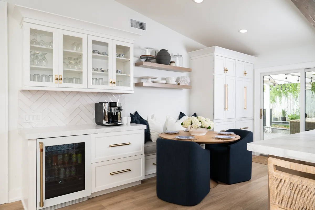 sea-pointe-design-and-remodel-additional-storage-off-to-side-of-kitchen-includes-glass-inserts-in-upper-cabinetry