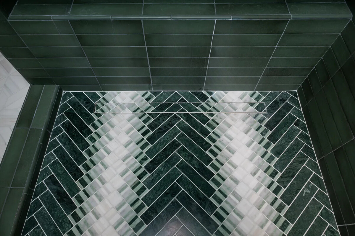 Sea-Pointe-Design-And-Remodel-ann-sacks-marble-shower-flooring-in-lotus-green-and-Thassos-with-linear drain