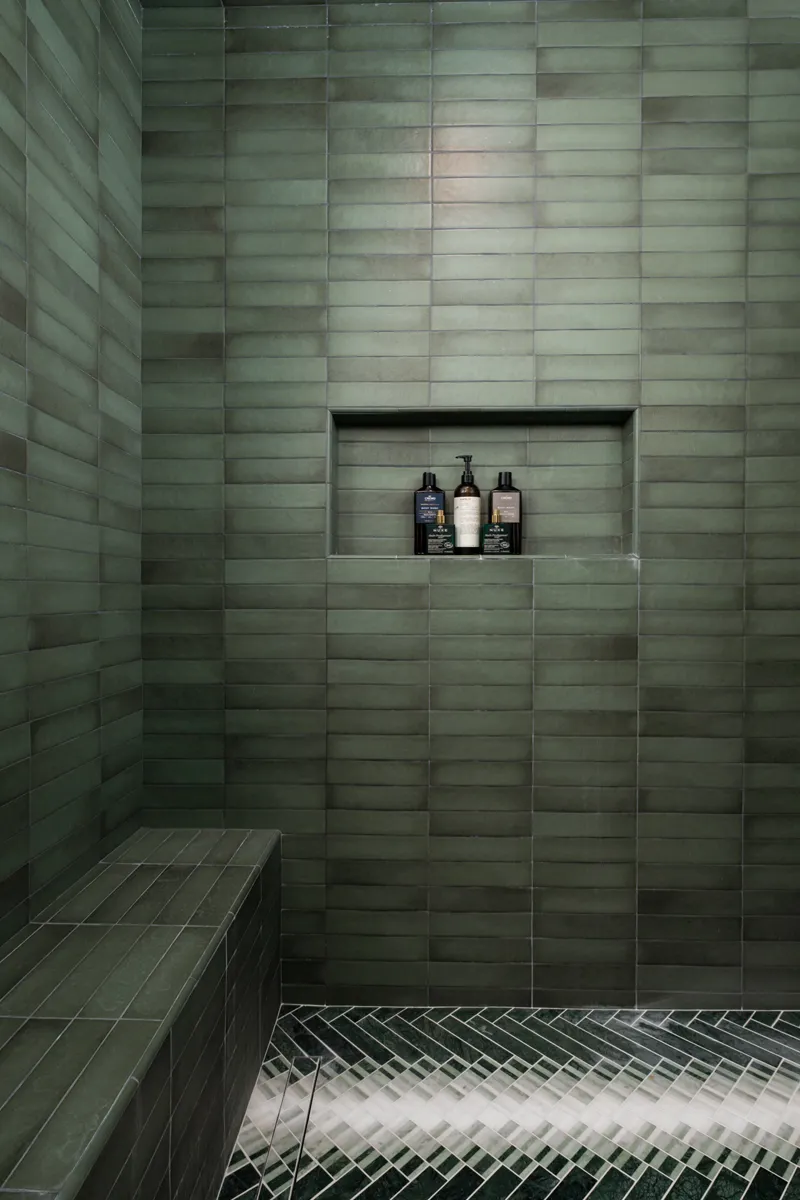 Sea-Pointe-Design-And-Remodel-shower-tiled-in-Midori-green-porcelain-tiles