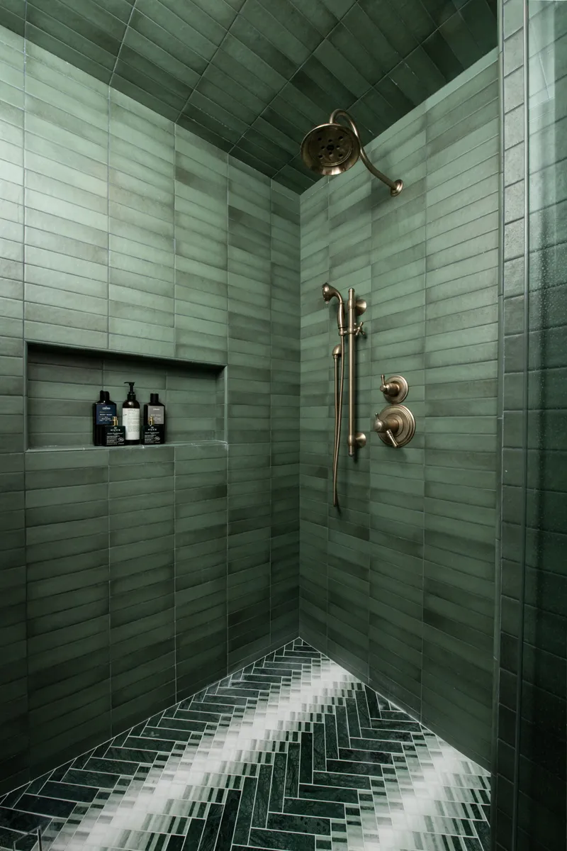 Sea-Pointe-Design-And-Remodel-Champagne-Bronze-shower-trim-with-slide-bar-handshower-2port-diverters-and-showerhead
