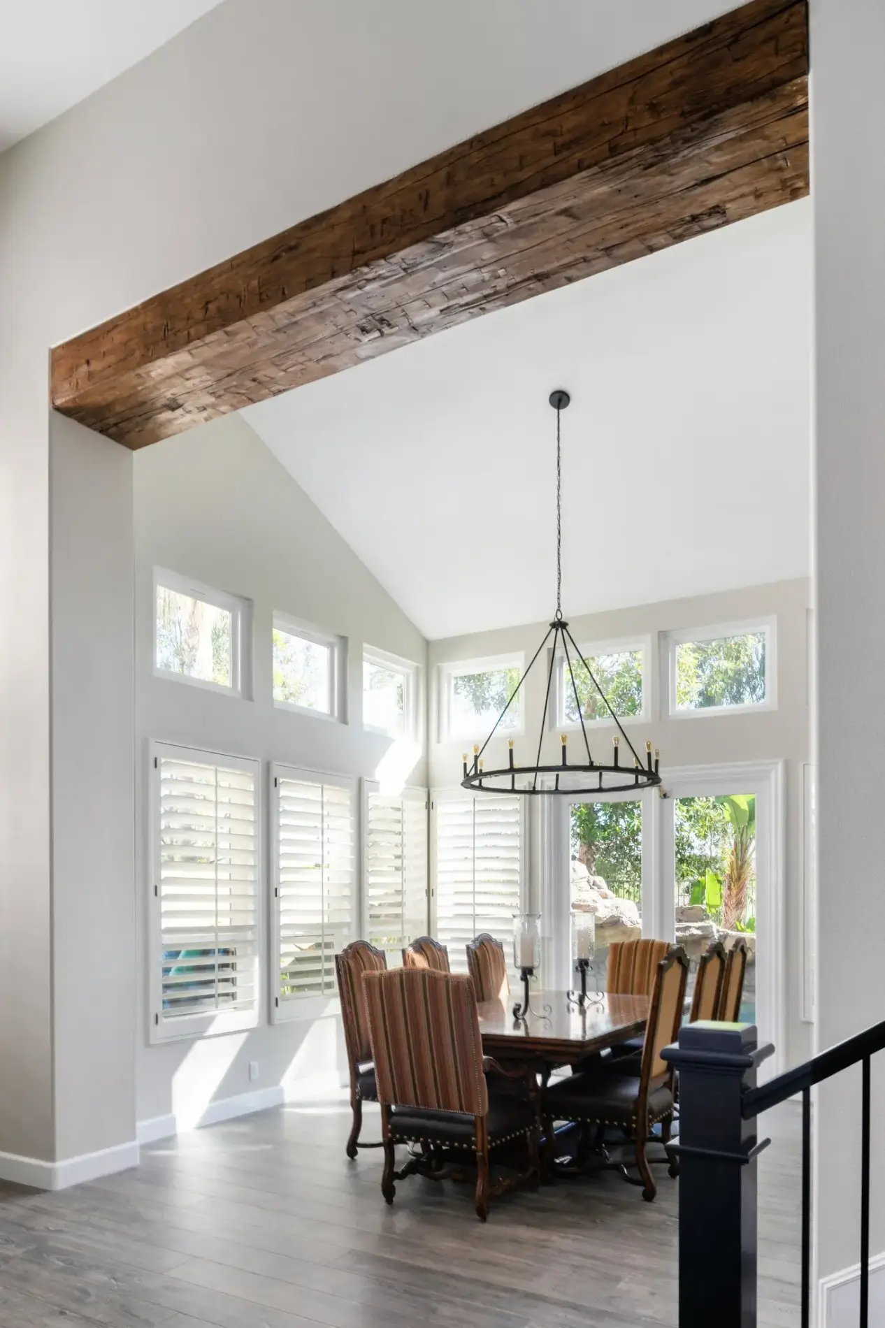 Wood-beam-entry-way-in-modern-dining-room-remodel
