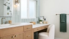 sea-pointe-design-and-remodel-make-up-vanity-with-seating-and-wall-mounted-make-up-mirror-with-extendable-arm
