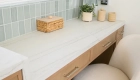 sea-pointe-design-and-remodel-Dekton-countertops-in-neutral-Oniriki-with-velvet-finish-and-miterde-edge