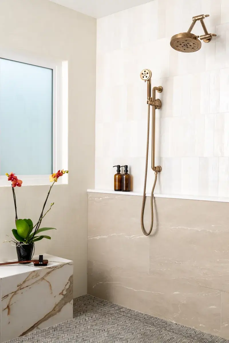 The latest tile trends for bathrooms includes large oversized tiles
