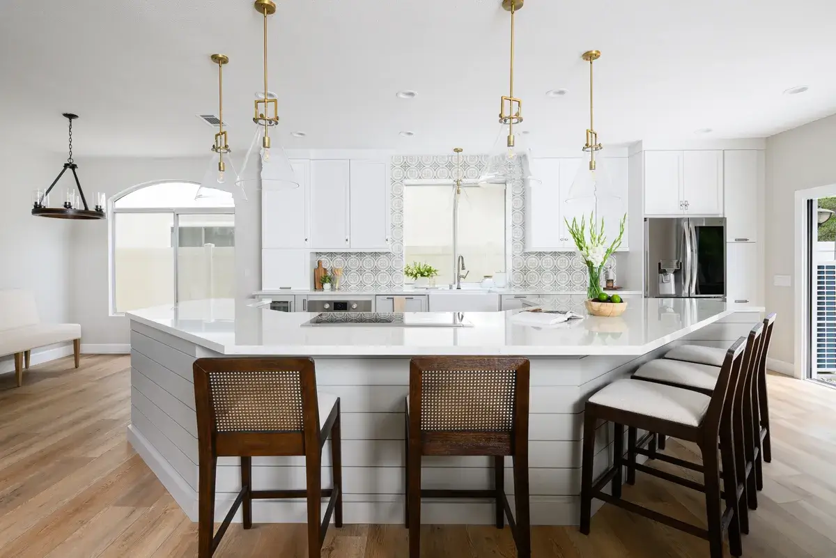 the-island-includes-a-Hidden-Pop-Up-Outlet-and-induction-cooktop-with-built-in-exhaust-hood-motor