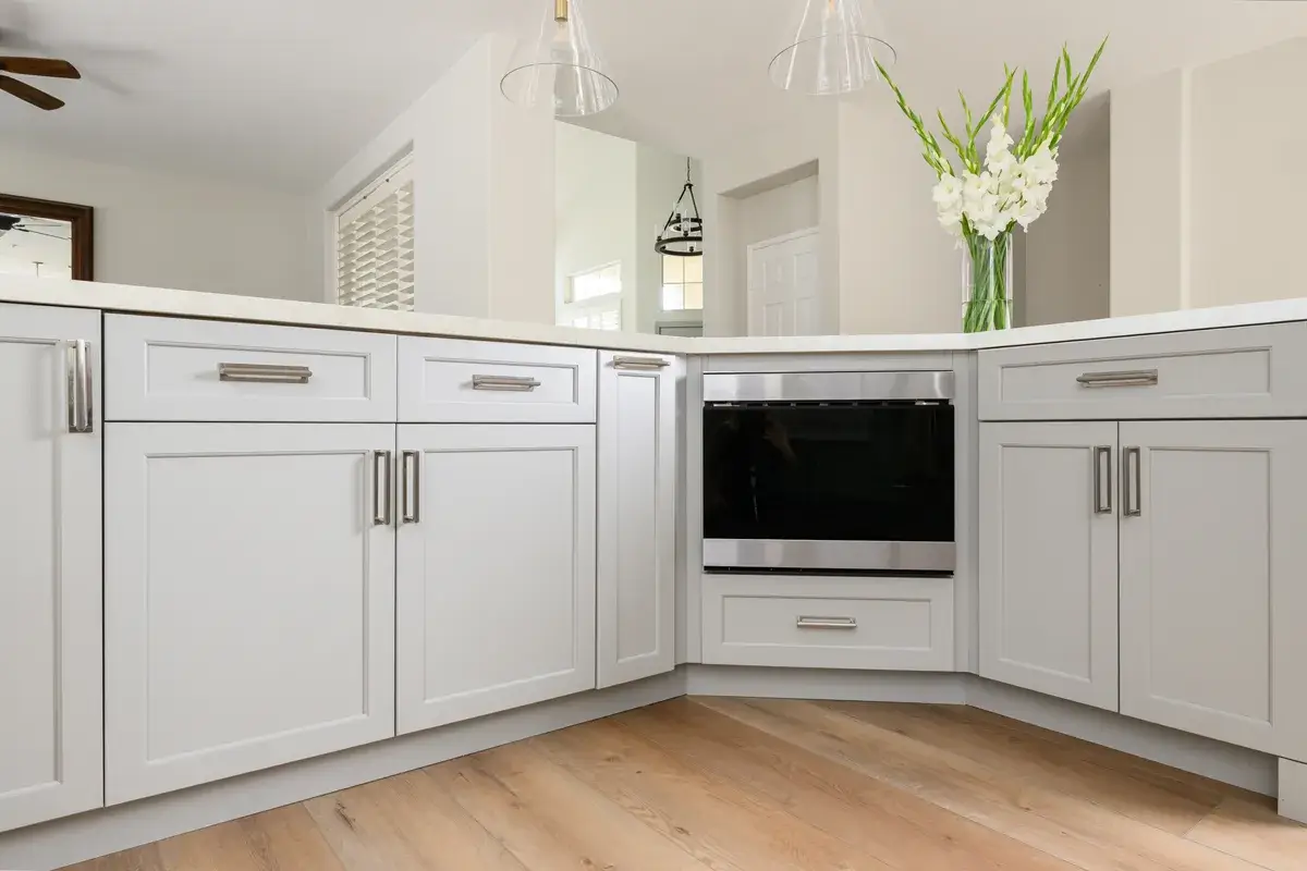 lower-perimeter-cabinets-and-island-by-Omega-in-a-Dove-finish