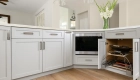 upper-perimeter-cabinets-by-Omega-in-Pearl-White-finish