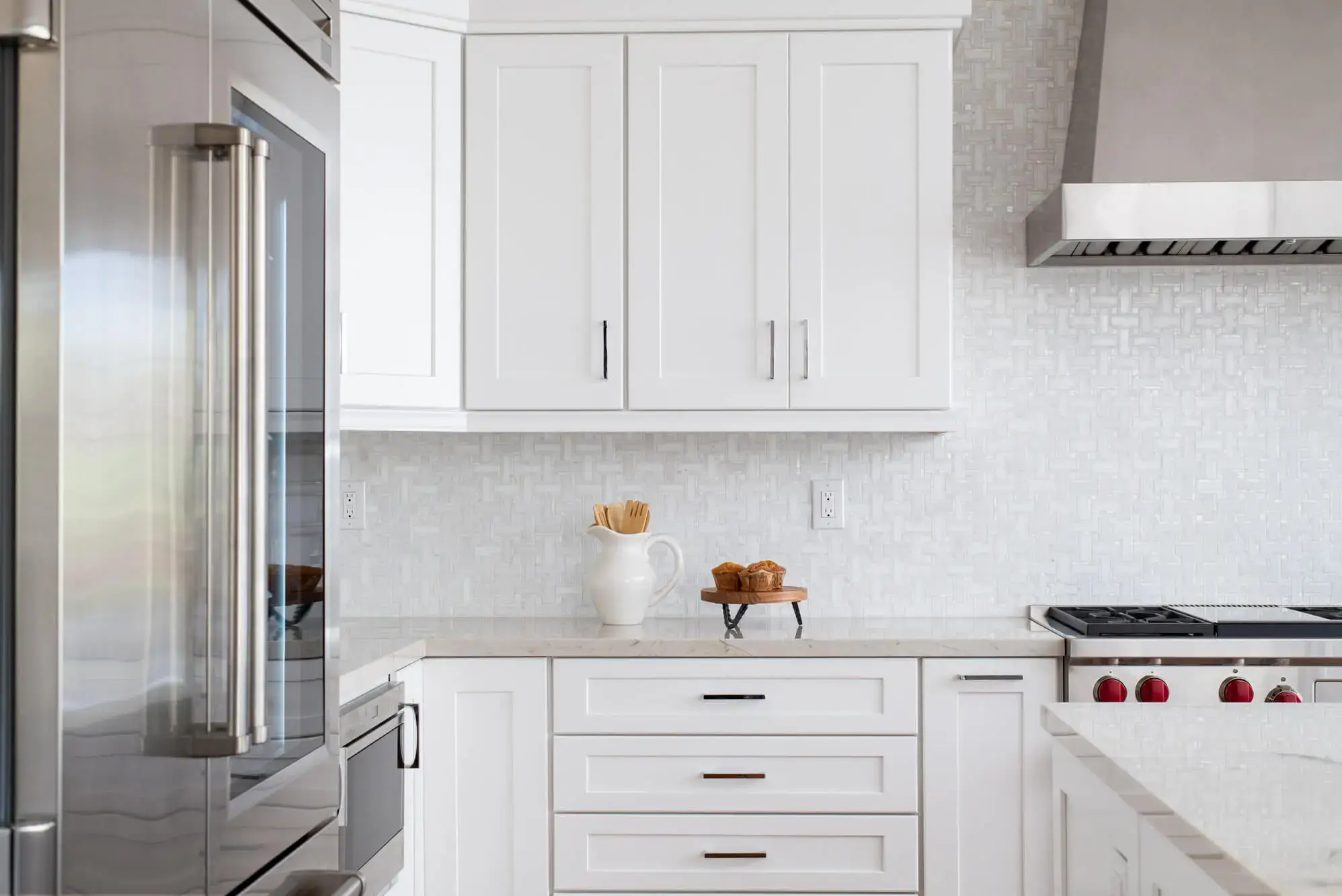 white-Irvine-kitchen-remodel-with-marble-backsplash-tile