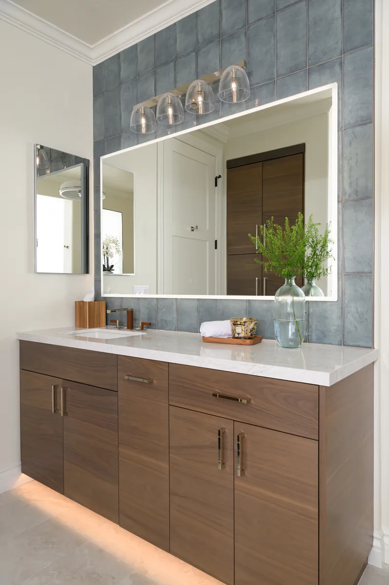 porcelain-backsplash-by-Exhale-series-in-Cielo-finish-and-vanity-toe-kick-lighting