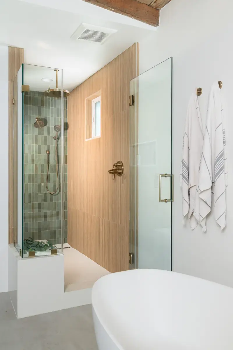 this-remodel-involved-a-wall-removal-combining-a-bedroom-and-small-primary-bathroom-combining-into-a-larger-bathroom