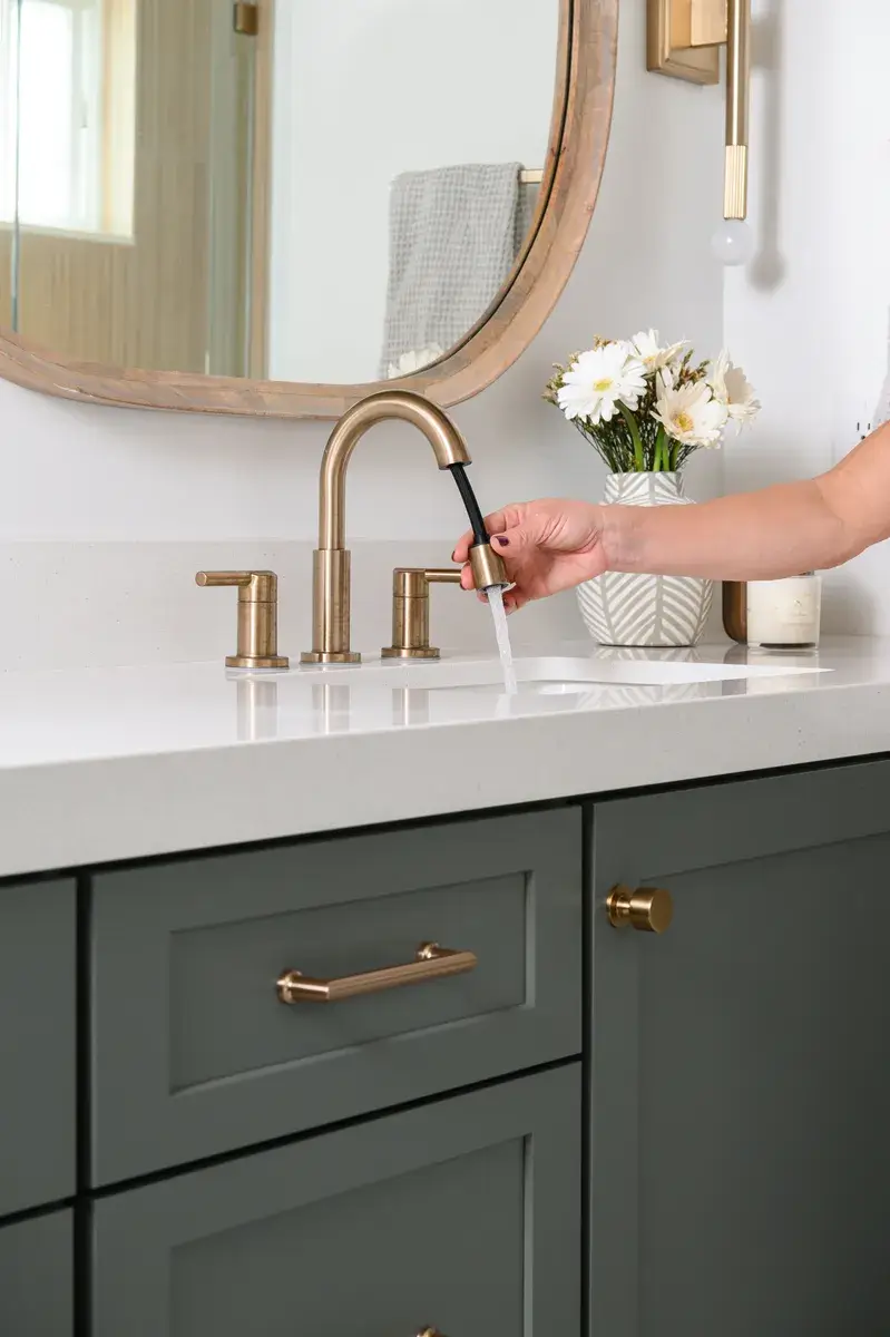 dual-white-undermount-bathroom-sinks-with-2-handle-widespread-pull-down-faucets-in-chamapgne-bronze