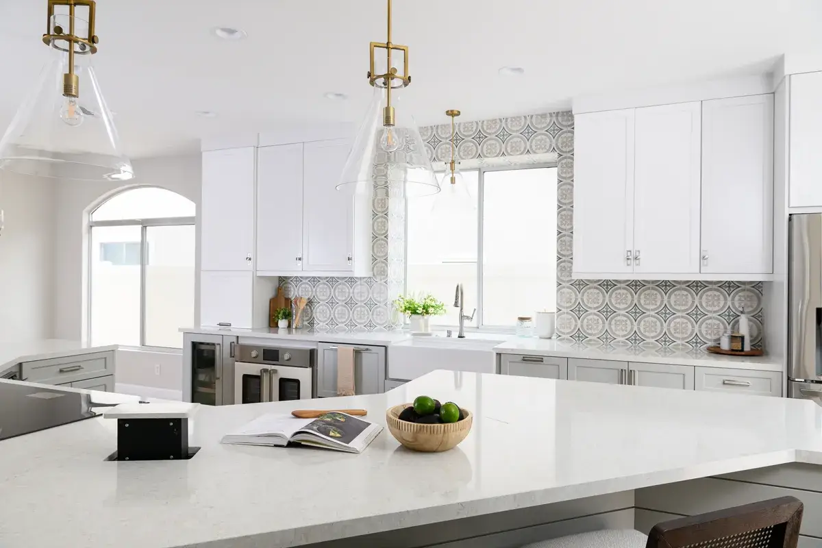 A pop-up outlet inside a kitchen island offers hidden convenience