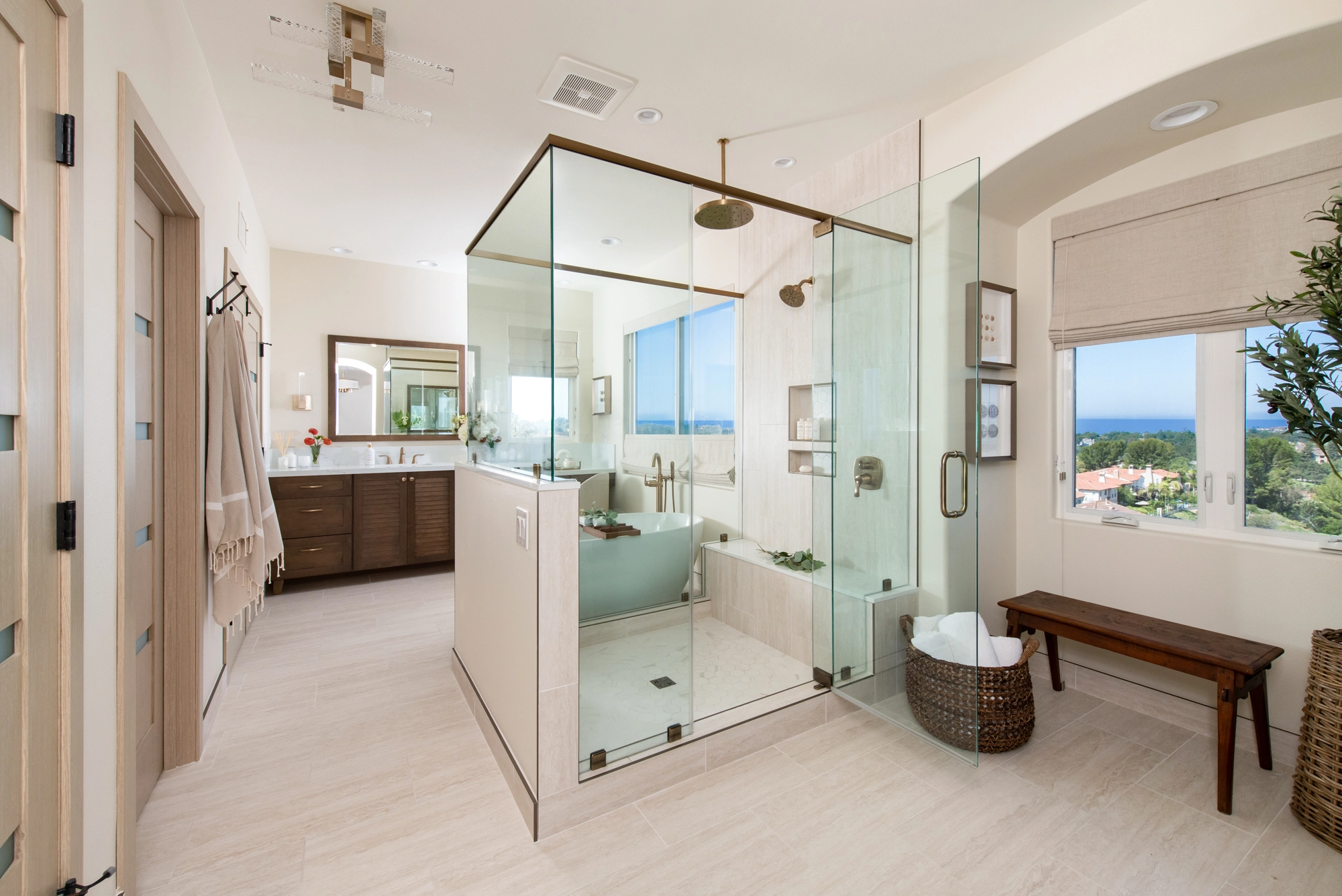 An open concept bathroom makes the space feel larger than it is