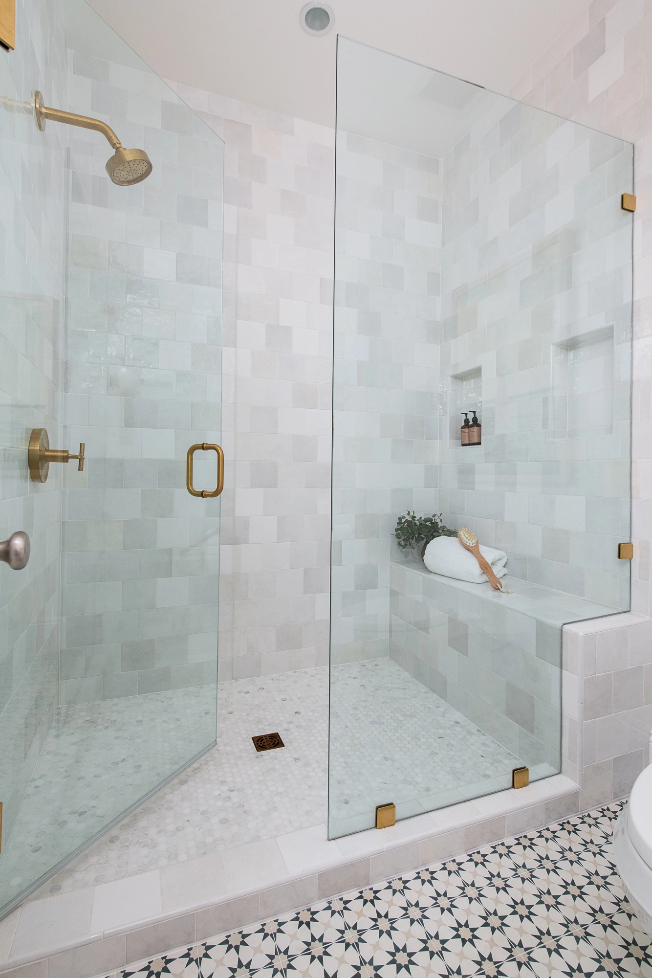 Mixed tile designs make a bold statement in 2026 bathroom remodels