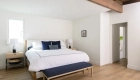 Primary-bedroom-was-redesigned-by-eliminating-a-guest-bath-to-extend-the-bed-and-bath-footprint