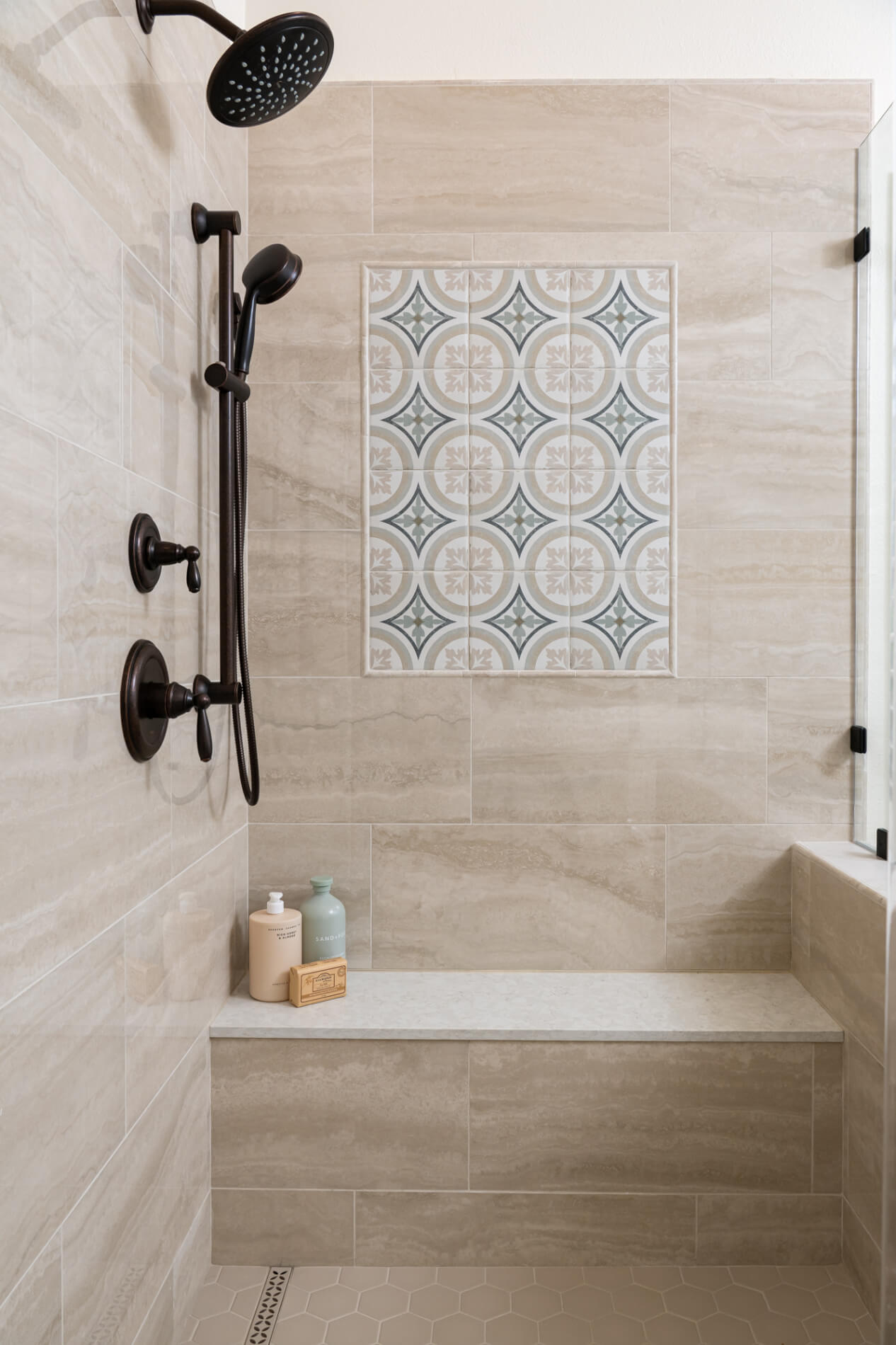 polished-beige-porcelain-shower-walls-with-Decco-Matte-accent-by-Marrakesh-Rubeli-series