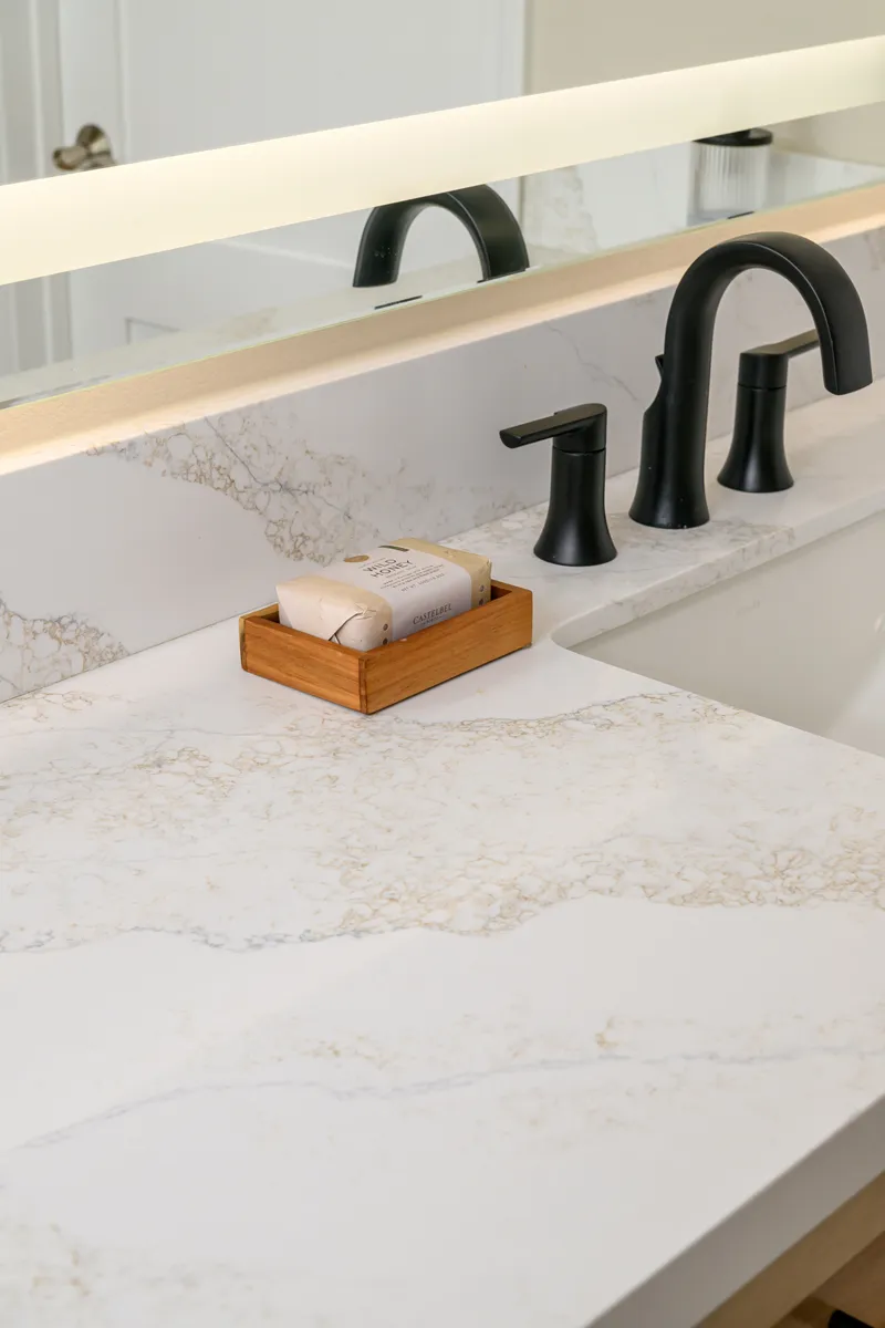 Golden-Scribe-quartz-countertops-with-polished-finish-and-5-inch-backsplash