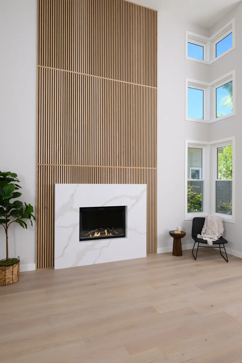 decorative-floor-to-ceiling-wood-paneling-above-fireplace
