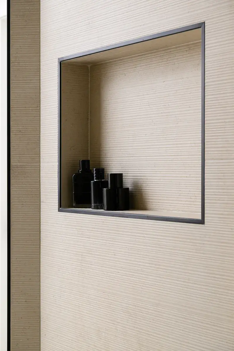 shower-niche-and-wainscot-outlined-with-black-schluter-trim