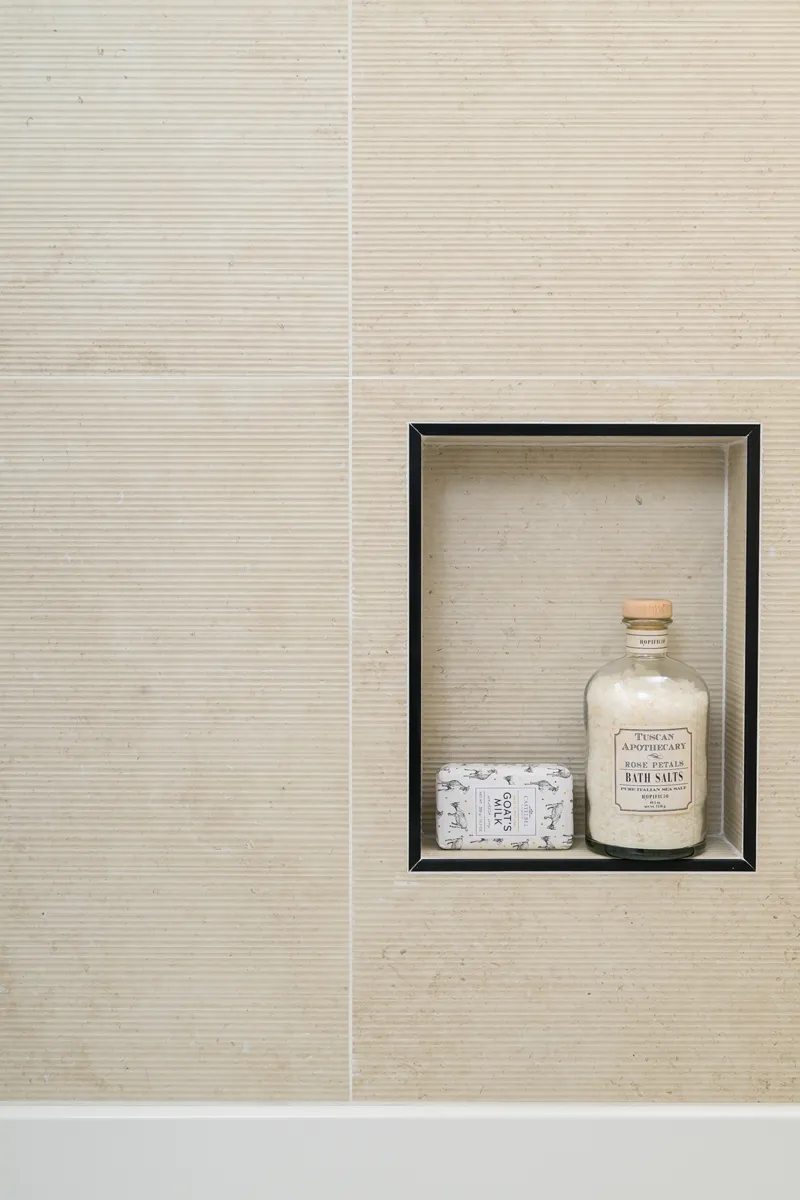 built-in-shower-niche-with-black-trim