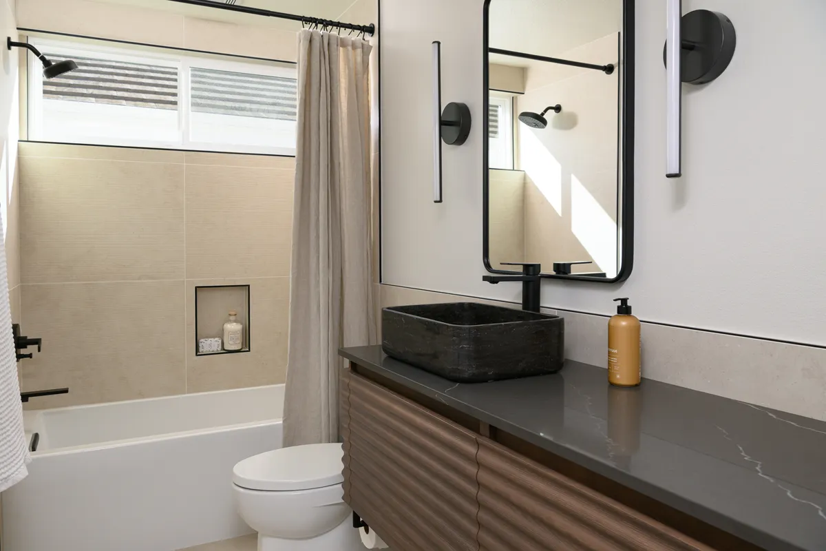 Ocala-floating-chestnut-bathroom-vanity-with-built-in-black-vessel-sink-and-matte-black-single-handle-faucet