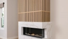 electric-fireplace-with-mantle-to-ceiling-decorative-natural-white-oak-slat-paneling