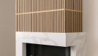 fireplace-surrounded-in-polished-quartz-in-Aurum