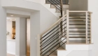 modern-black-metal-balusters-with-white-oak-handrails-and-posts