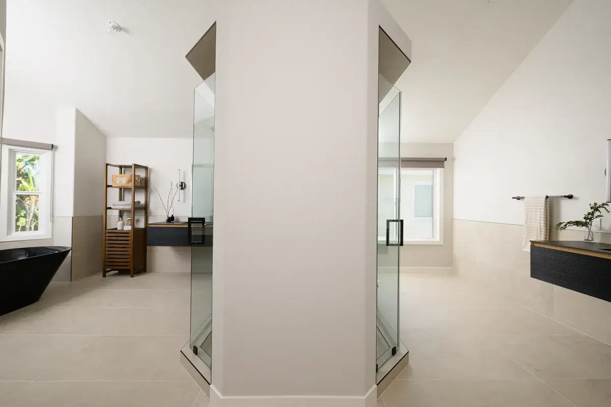 custom-shower-with-2-entrances-including-clear-glass-doors-with-matte-black-square-handles