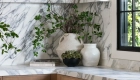 perimeter-countertops-and-backsplash-are-a-polished-marble-in-Arabescato-Corchia