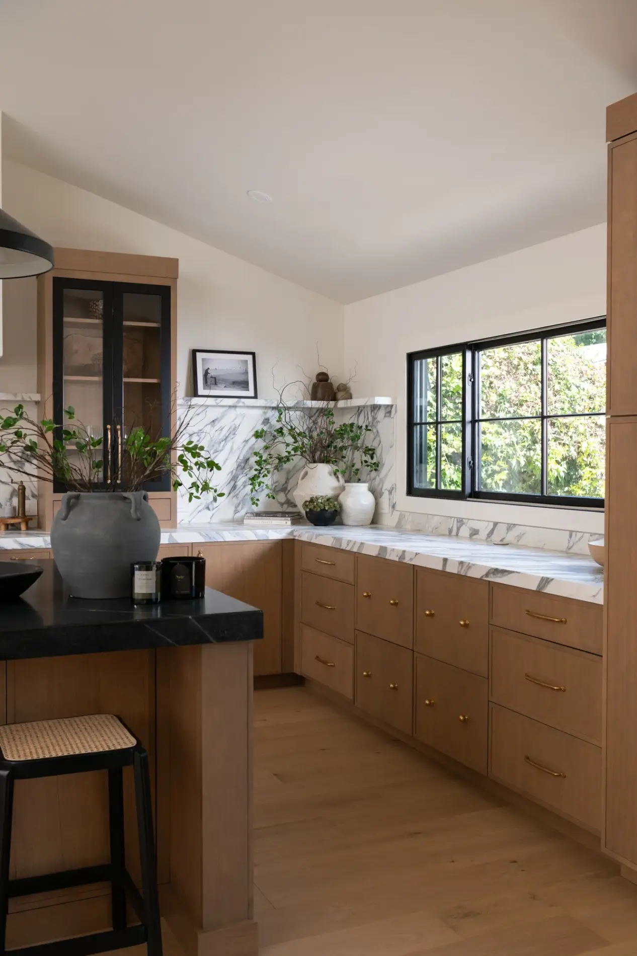the-remodel-included-new-windows-above-the-countertop-and-relocation-of-french-doors-for-backyard-access