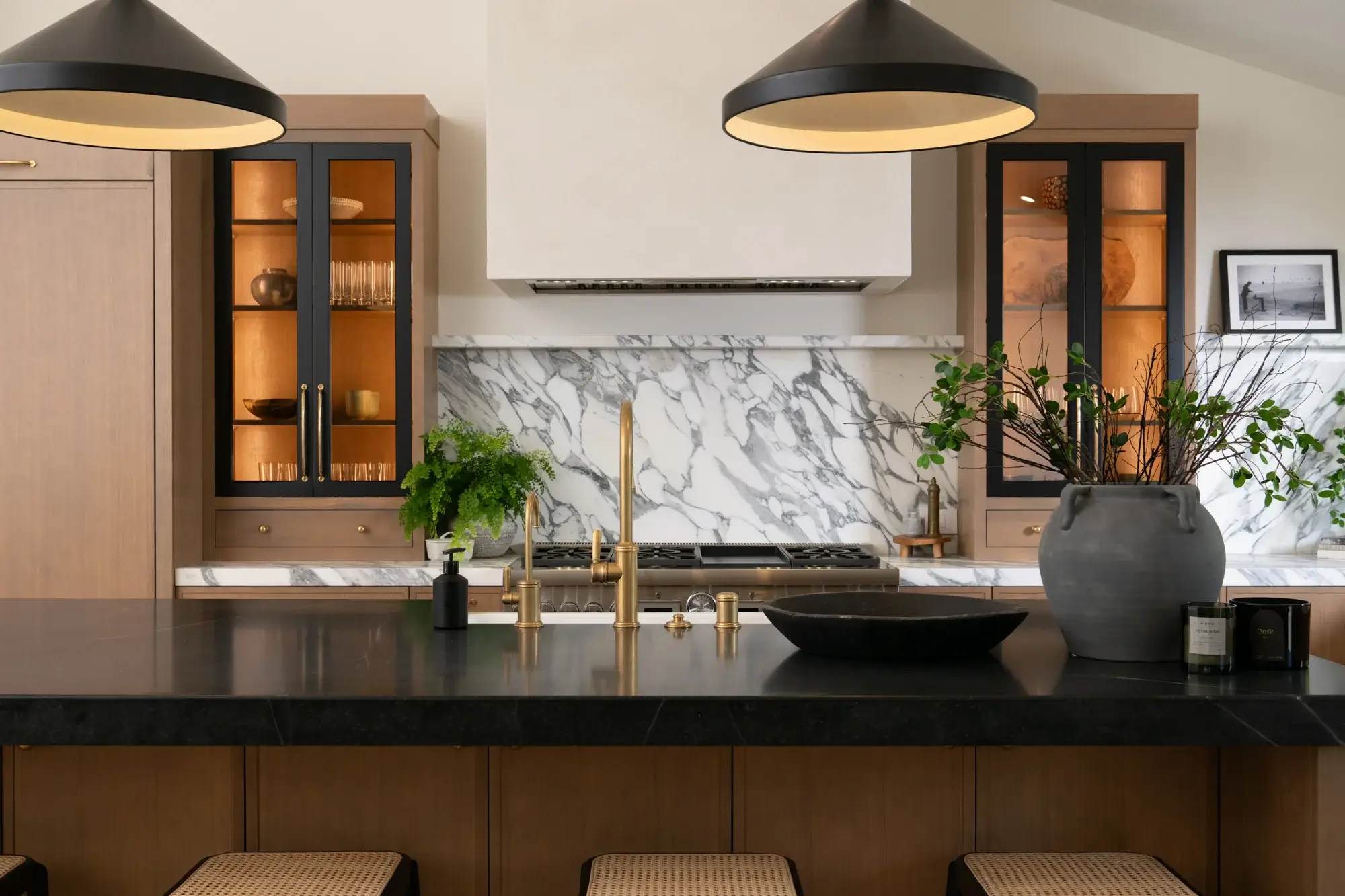 island-includes-a-white-undermount-farmhouse-sink-with-burnished-brass-pull-down-faucet