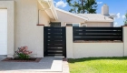 exterior-gates-and-railings-were-installed-in-the-front-entry-and-side-and-back-yards