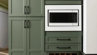 custom-storage-options-include-wood-tray-dividers-in-cabinet-under-mircowave-utensile-tray-and-shallow-drawer-dividers-and-Lemans-organizer-in-blind-corner-cabinet