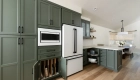 Waypoint-cabinets-in-Sage-finish-with-matte-black-pulls