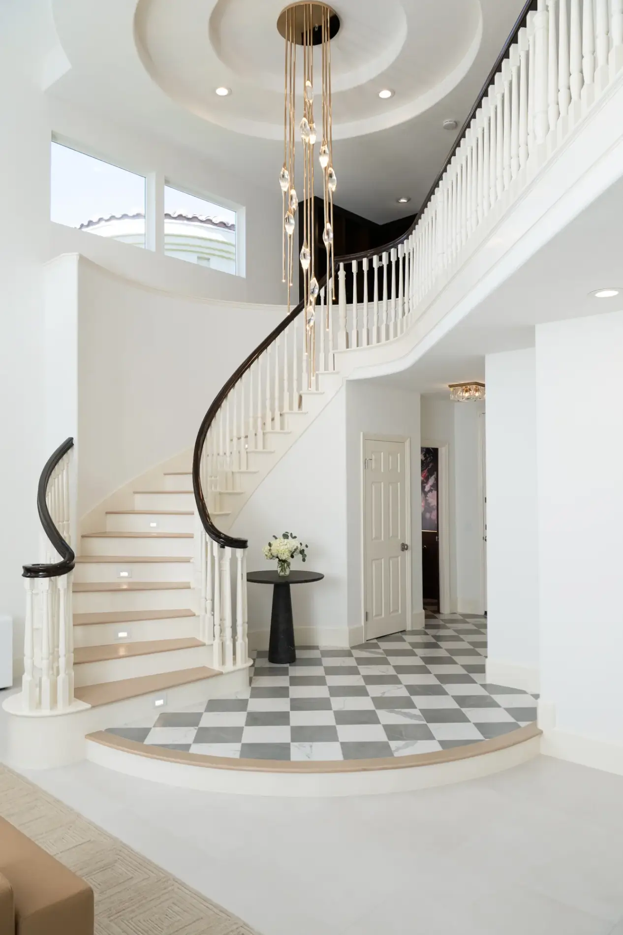 Foyer-and-powder-bath-flooring-with-checkerboard-pattern-in-Amani-gray-and-calcatta-white-with-matte-finish