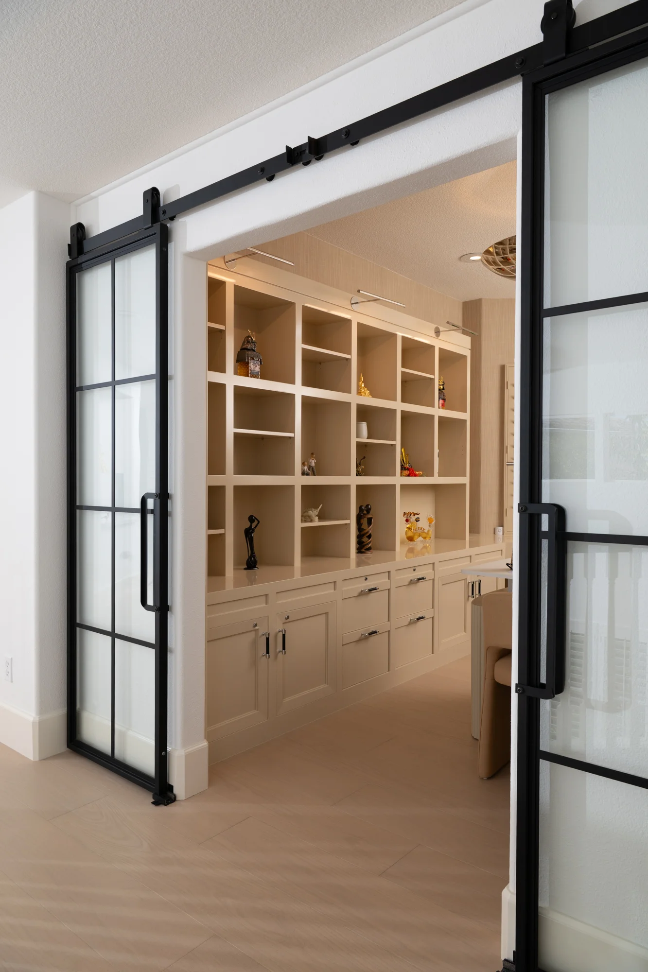 office-updated-with-sleek-black-barn-door-entrance
