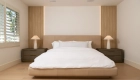 visual-interest-is-added-to-the-master-suite-with-decorative-wood-slat-accent-walls
