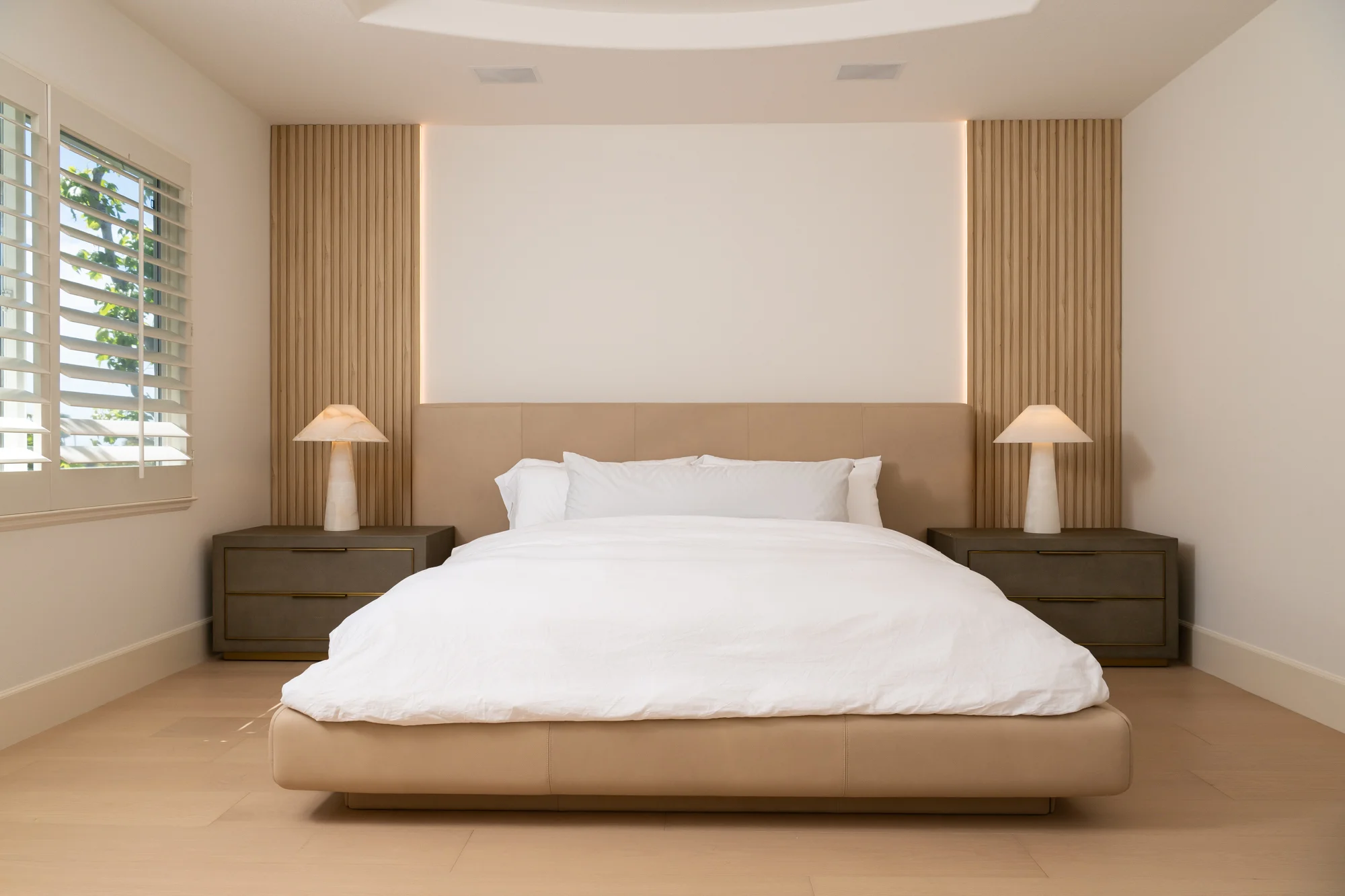 visual-interest-is-added-to-the-master-suite-with-decorative-wood-slat-accent-walls