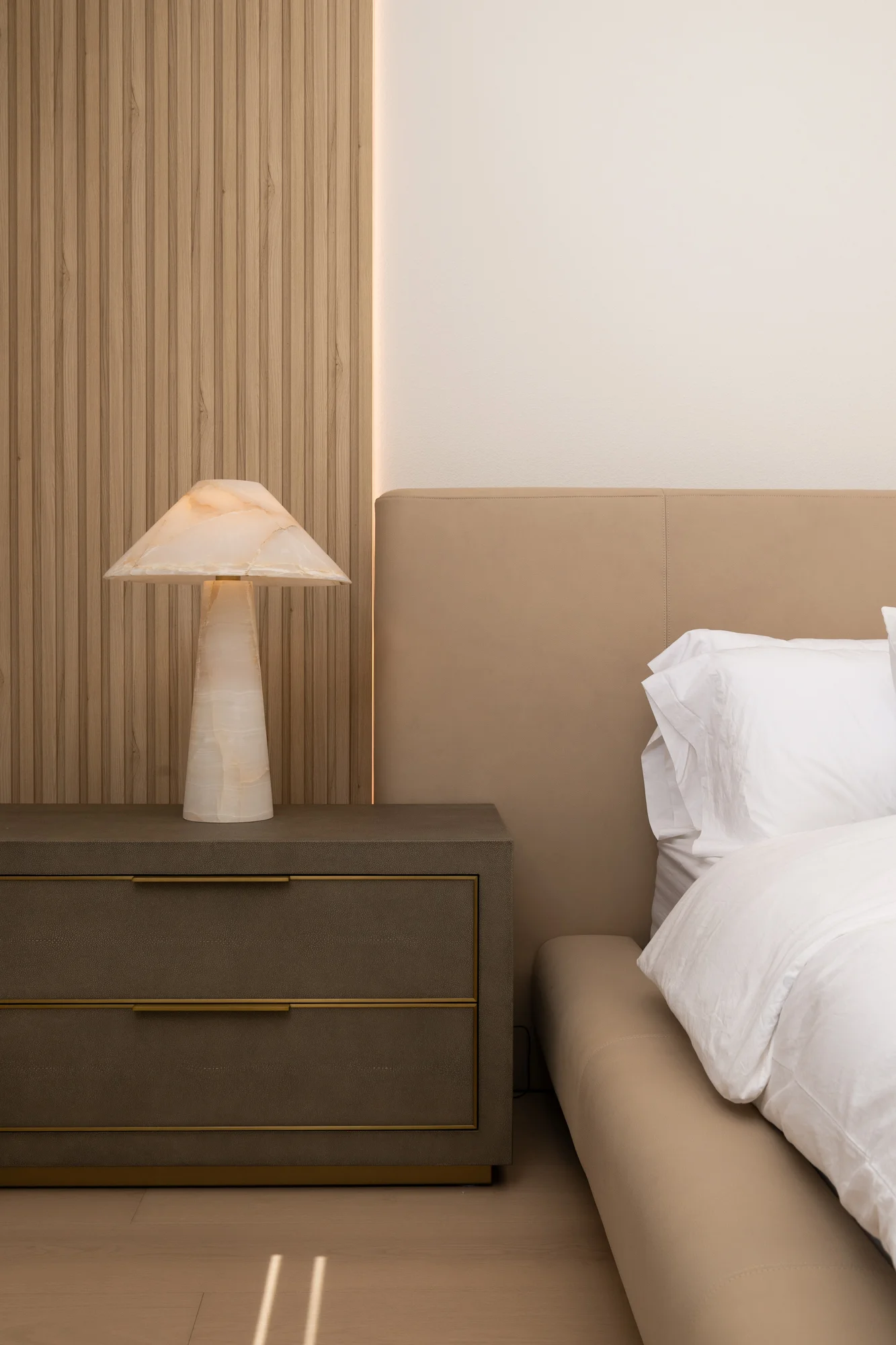 integrated-LED-strip-lighting-behind-primary-bedroom-accent-wall