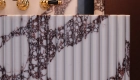 Duchess-wall-mounted-bathroom-faucet-in-polished-brass-with-black-ceramic-handles