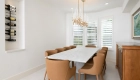polished-Sabino-quartz-slabs-were-added-to-each-niche-and-low-wall-cap-throughout-the-home