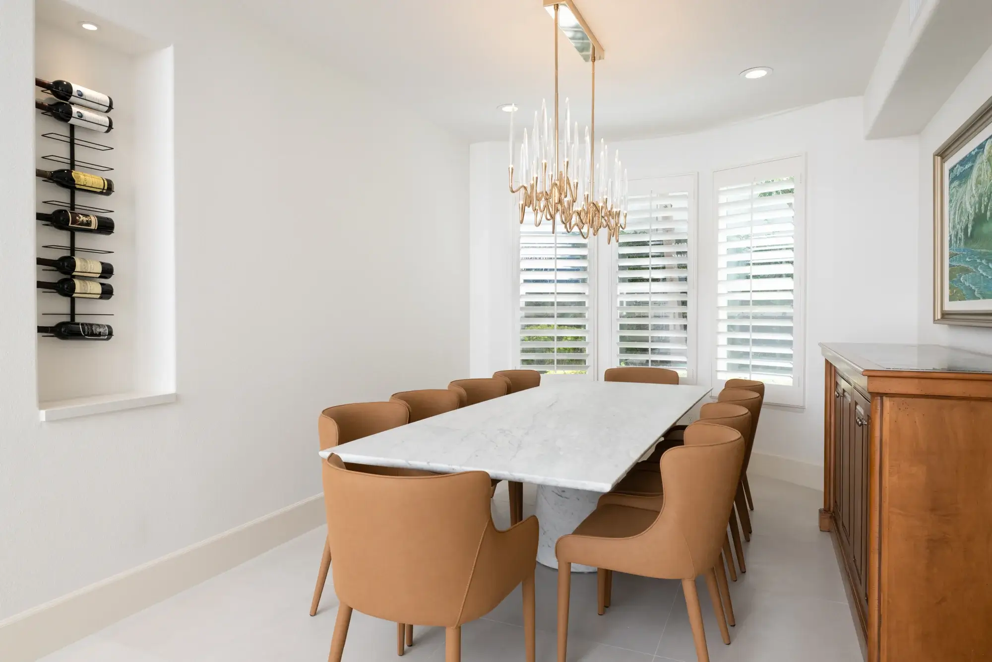 polished-Sabino-quartz-slabs-were-added-to-each-niche-and-low-wall-cap-throughout-the-home